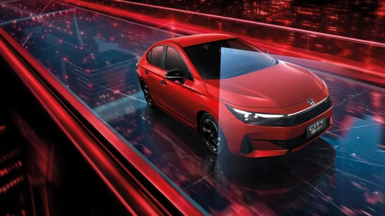 Red Honda City sedan driving on a glass bridge with neon red city lights in the background.